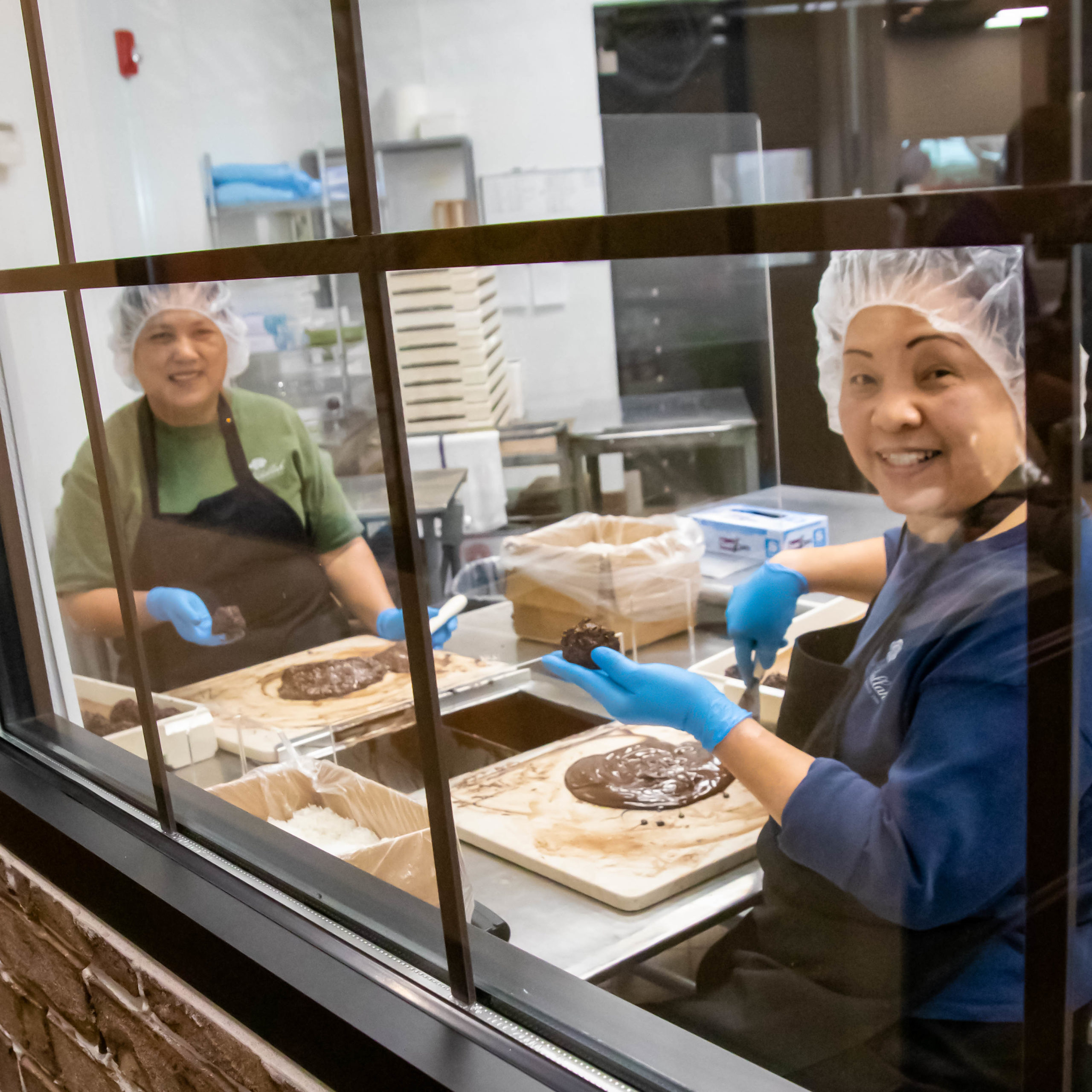 Abdallah Employees making chocolate confections
