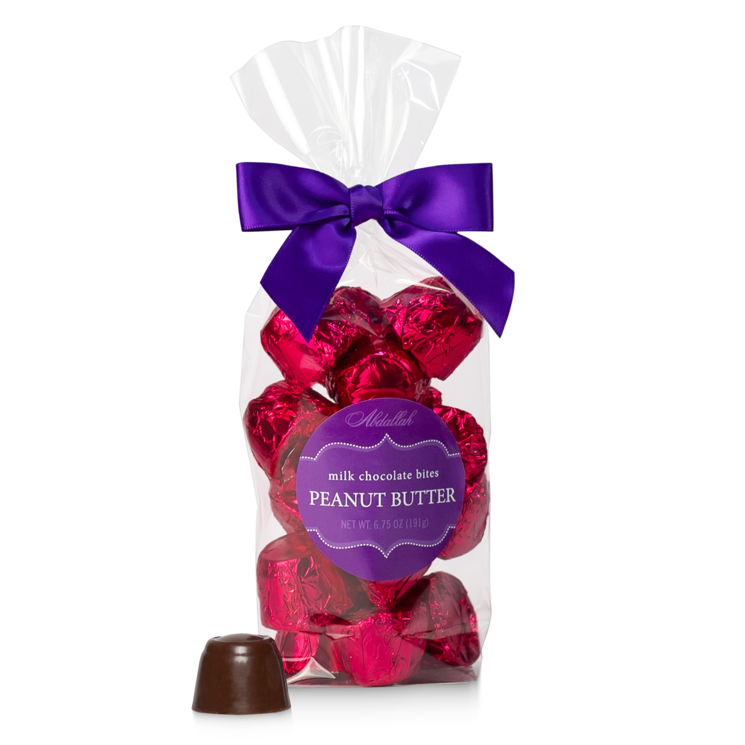 Milk Chocolate Peanut Butter Bites bag of chocolates with purple ribbon